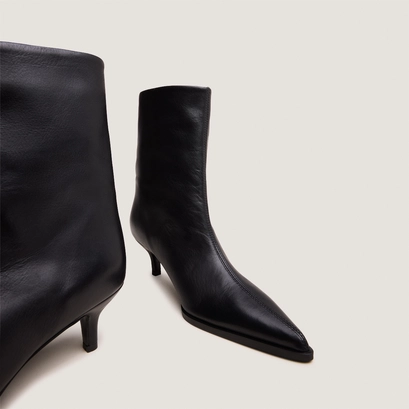 Low thin-heeled pointed-toe ankle boots in soft black leather | delanie
