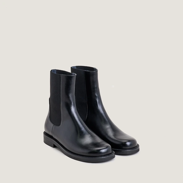 Boots with elastic panels in black leather | DELODIE