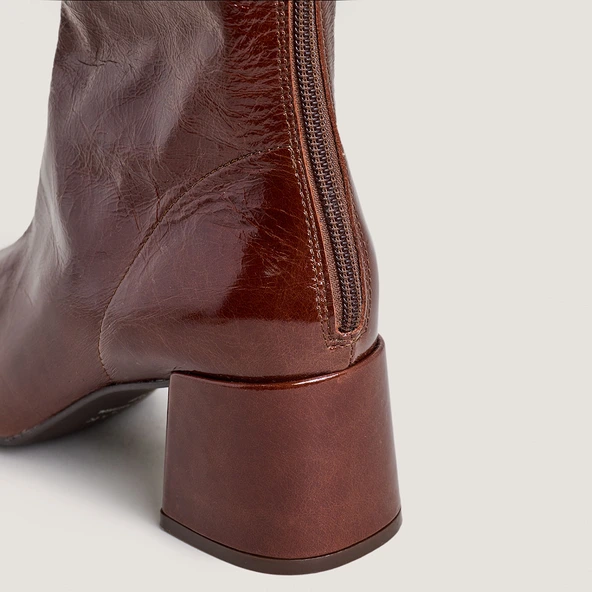 Square-toe boots in brown distressed leather | ARGENTINE