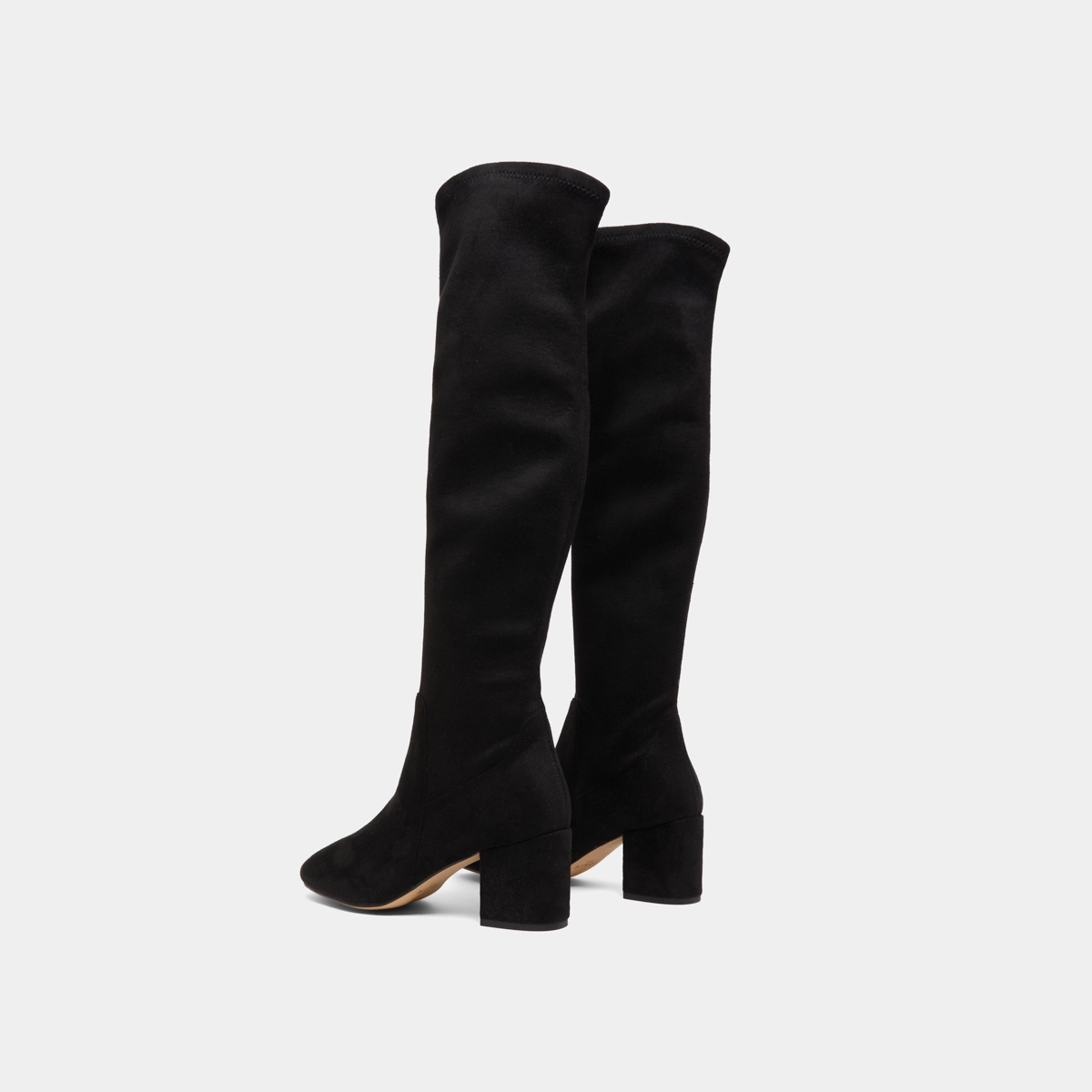 Thigh-high boots with low heels in black stretch and velvet | MIA