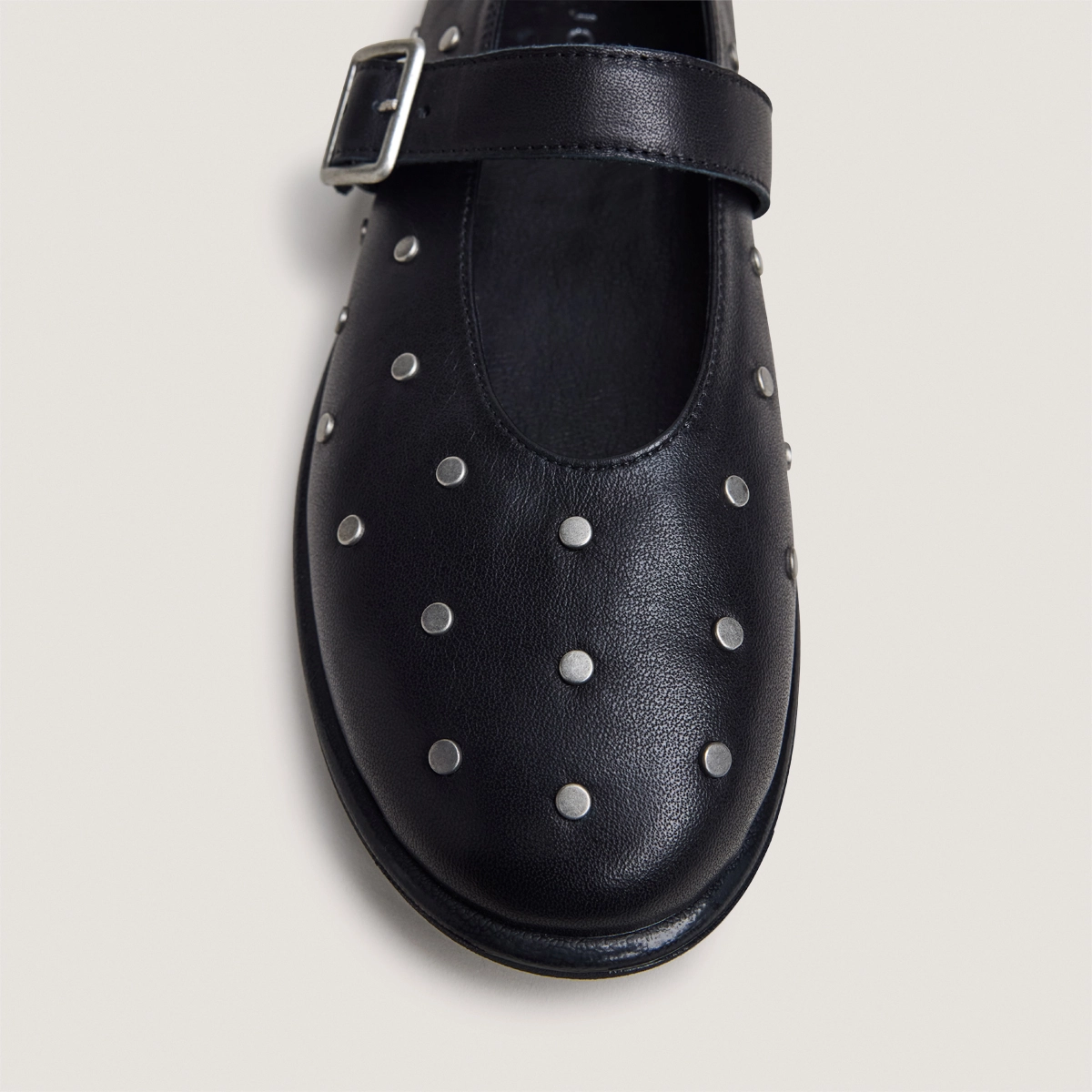 Ballet flats with buckles and studs in black leather | JOLIE