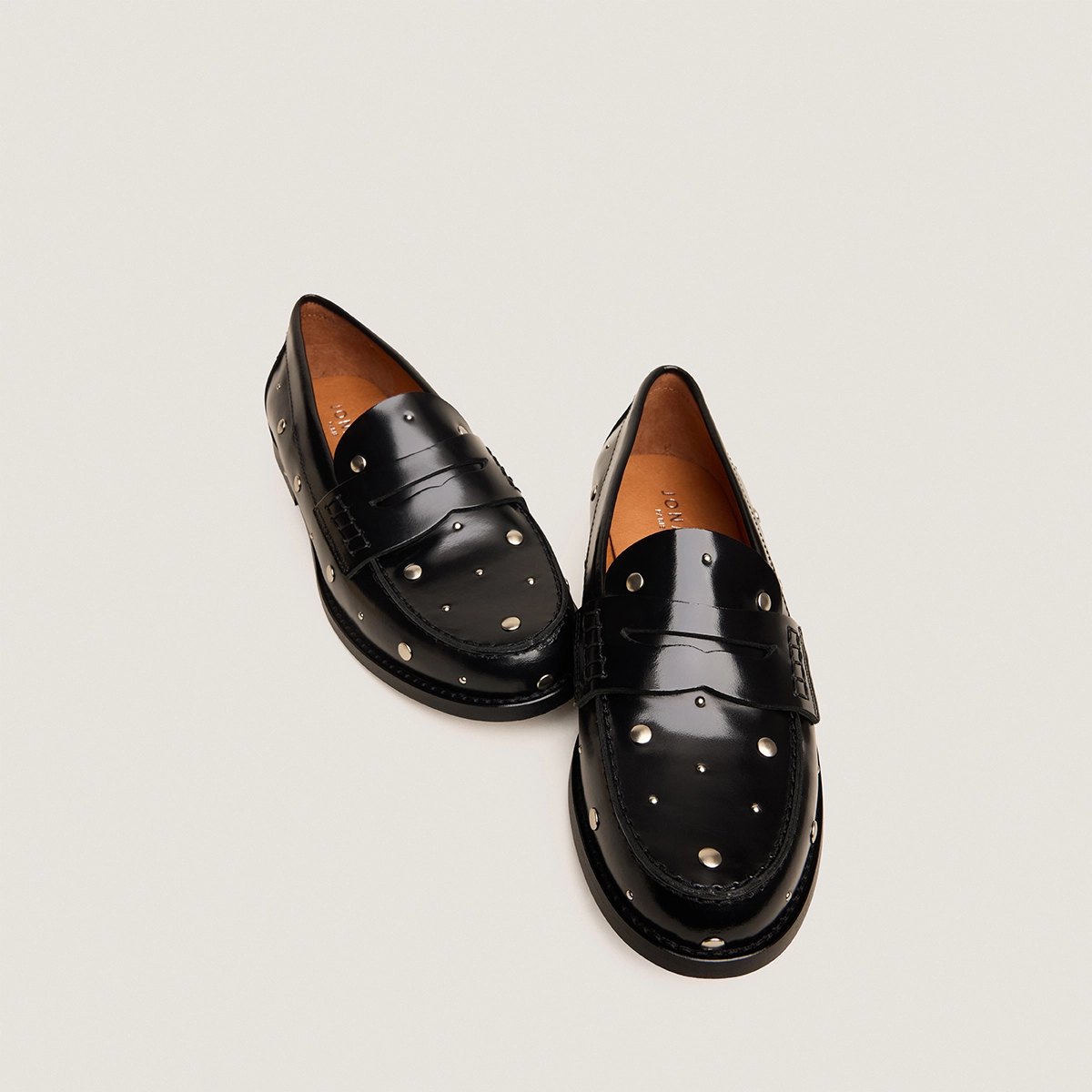 Loafers with studs in black glazed leather | ANDREW