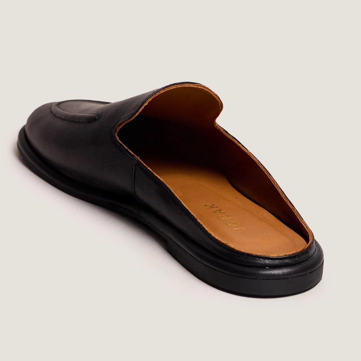 Backless loafers in black leather | JULY
