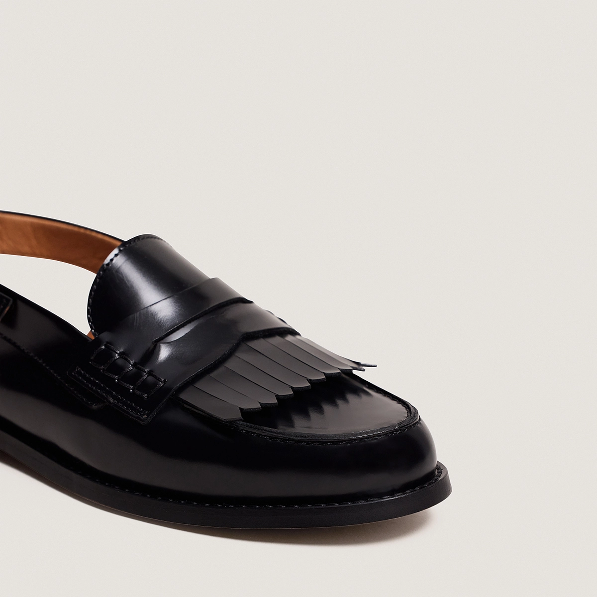 Open-back loafers in black glossy leather | AUDELLE