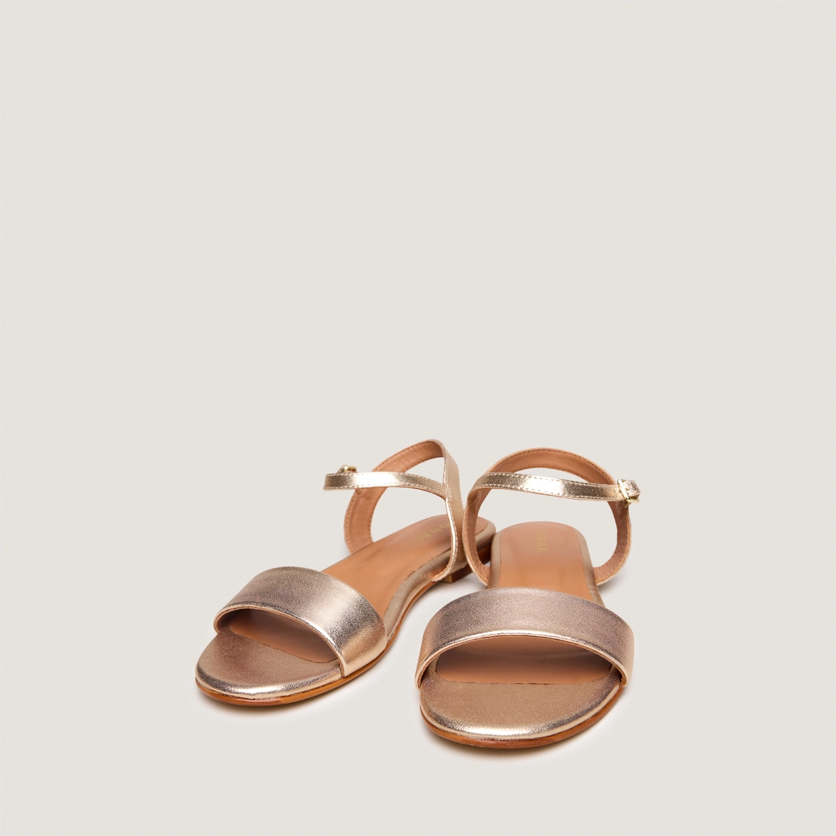 Flat strap sandals in gold metallic leather | WAGRAM