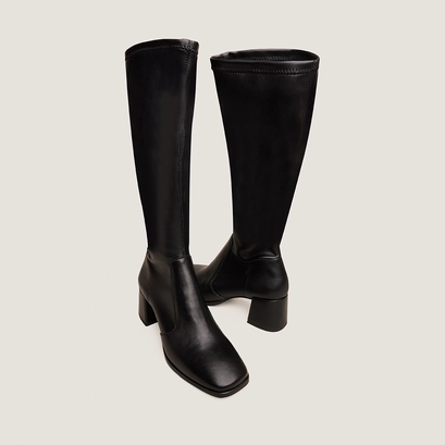 Heeled boots in black leather and black stretch | augusta