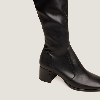Heeled boots in black leather and black stretch | augusta