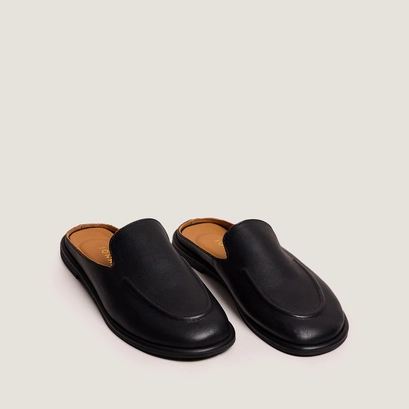 Backless loafers in black leather | JULY
