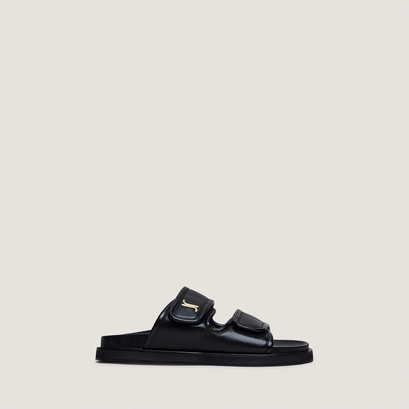 Monogrammed mules in black leather | win