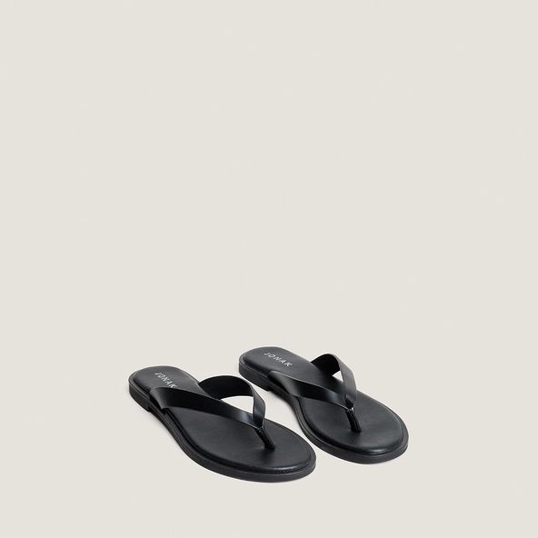 Thong sandals in black leather | WITTY