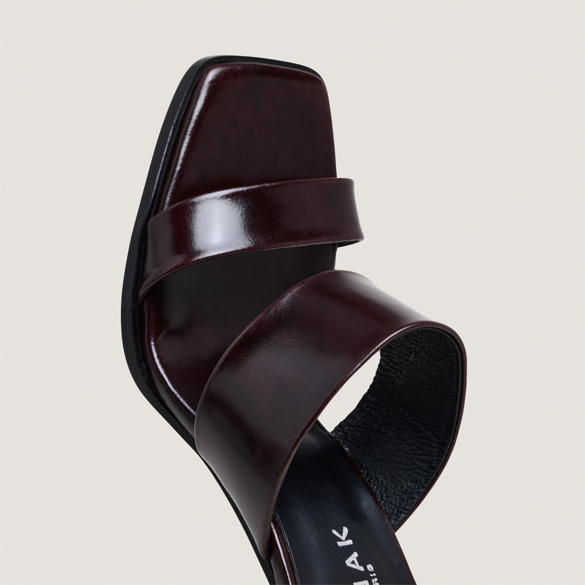 Heeled mules with double straps in dark brown leather | BRITNEY
