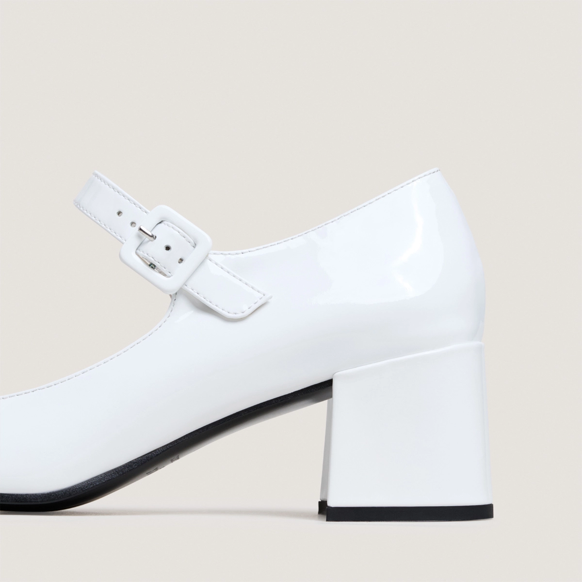 Heeled Mary Janes in white pleated patent leather | DITTUS
