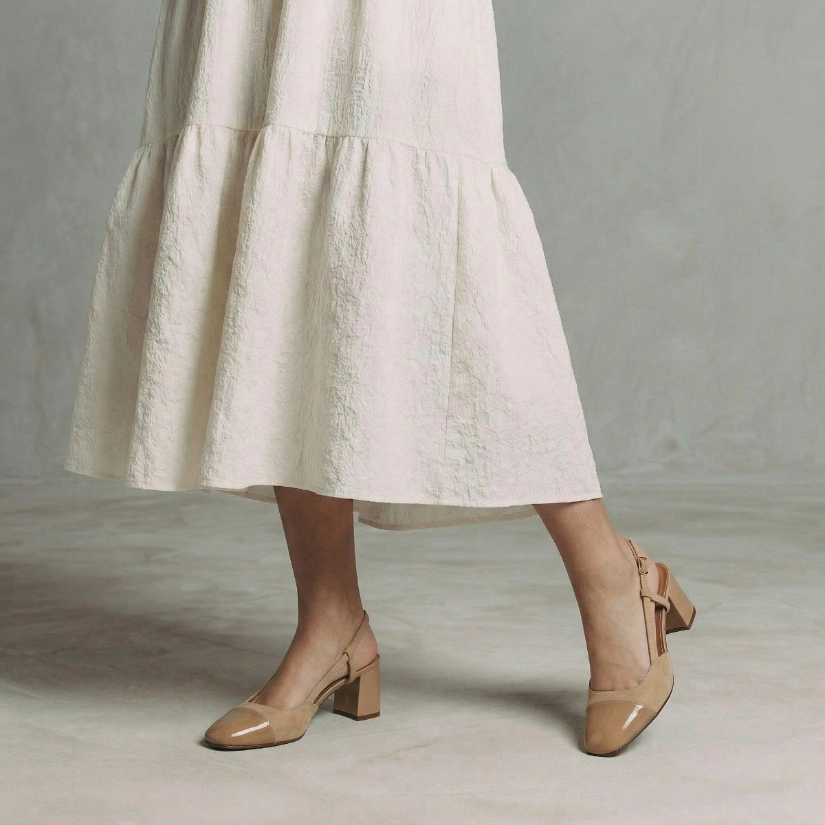 Heeled slingbacks in camel patent leather and suede | DHAPOP