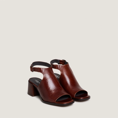 Heeled sandals with an open back in brown patent leather | benita