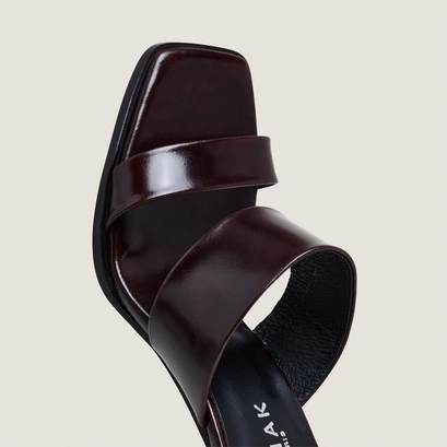Heeled mules with double straps in dark brown leather | britney