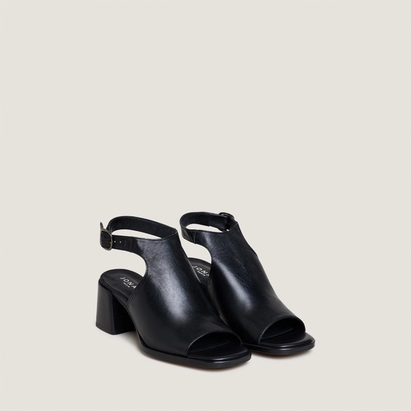 Heeled sandals with an open back in black leather | BENITA