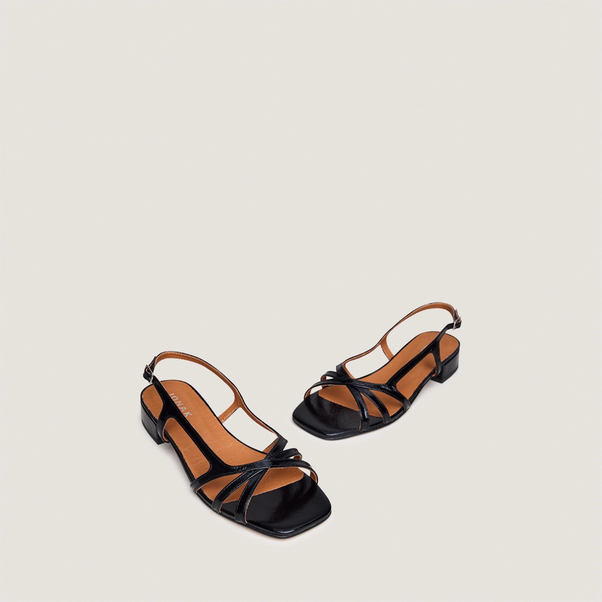 Low-heel sandals in black glossy leather | ARGOS