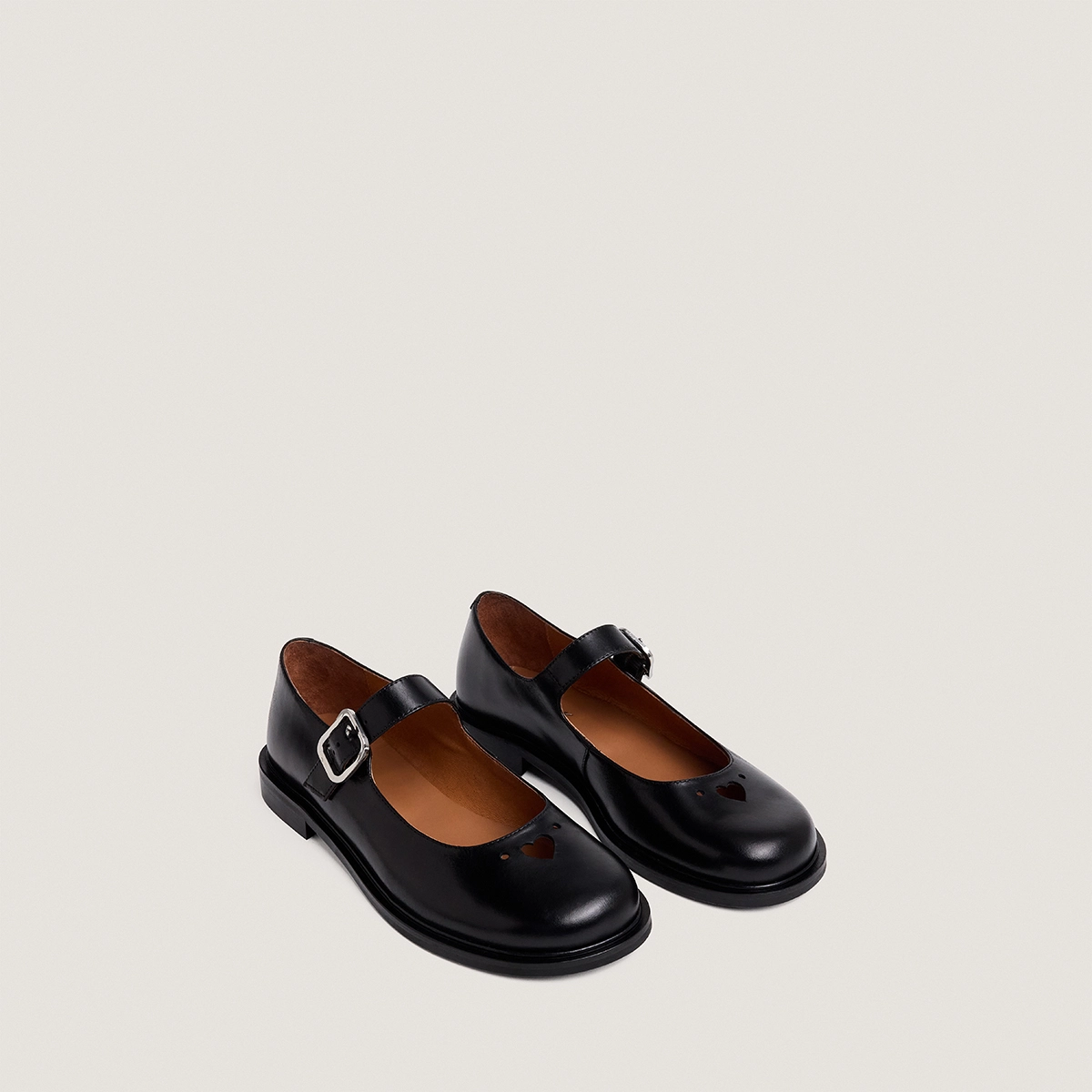 Ballet flats with straps in black leather | DOUCELINE