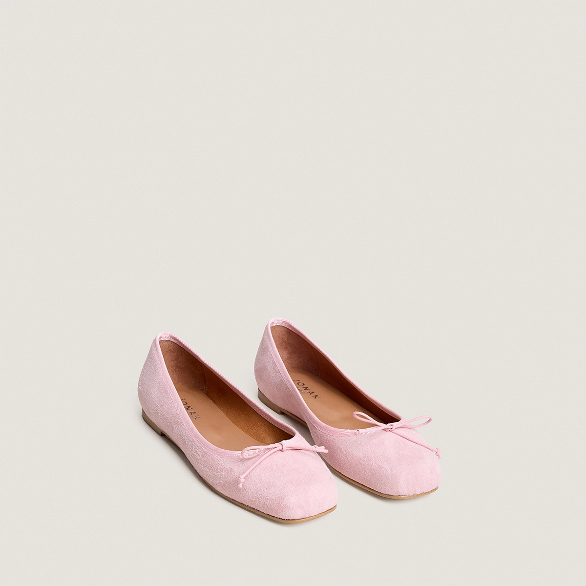 Square-toe ballet flats with laces in petal pink suede | DOMINE