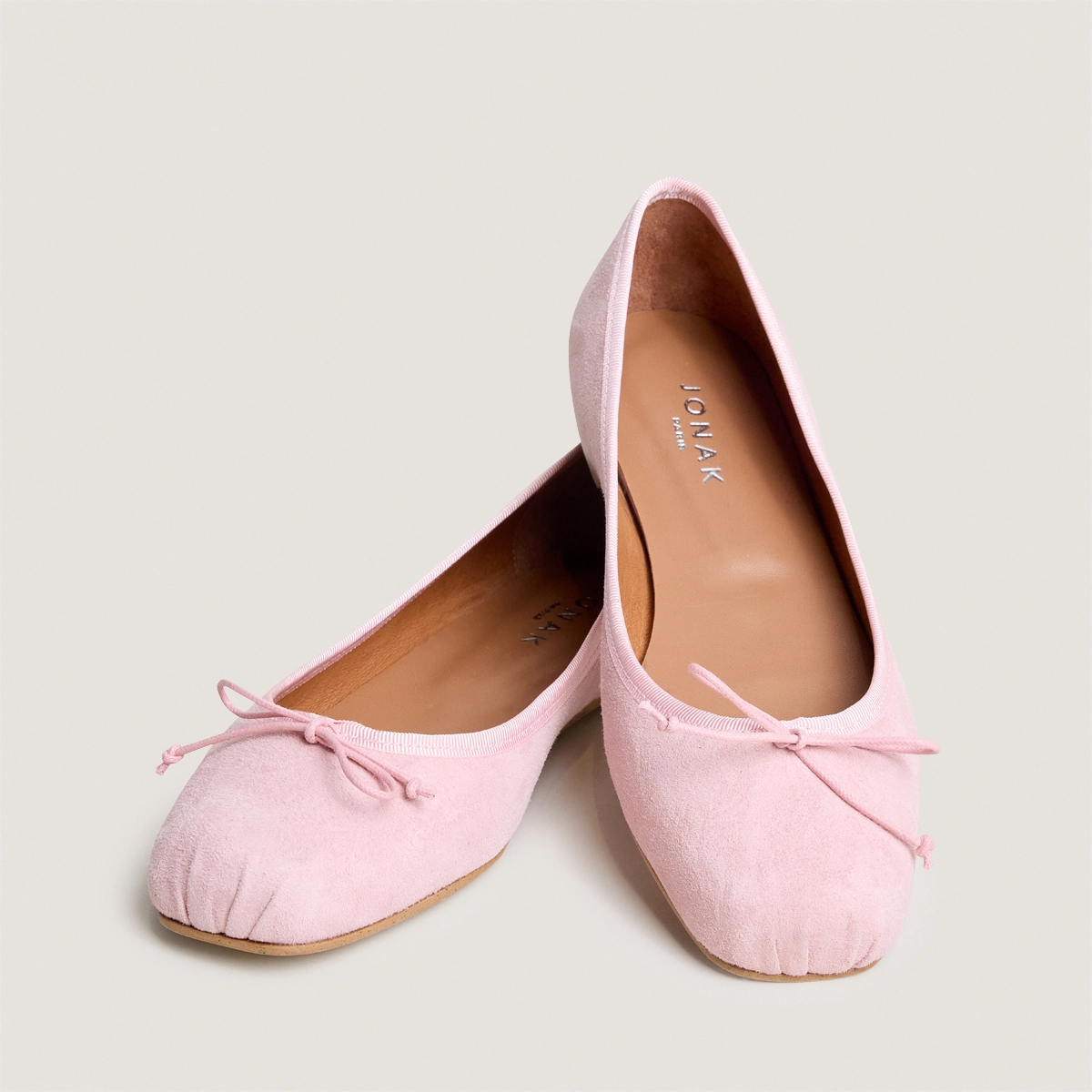 Square-toe ballet flats with laces in petal pink suede | DOMINE