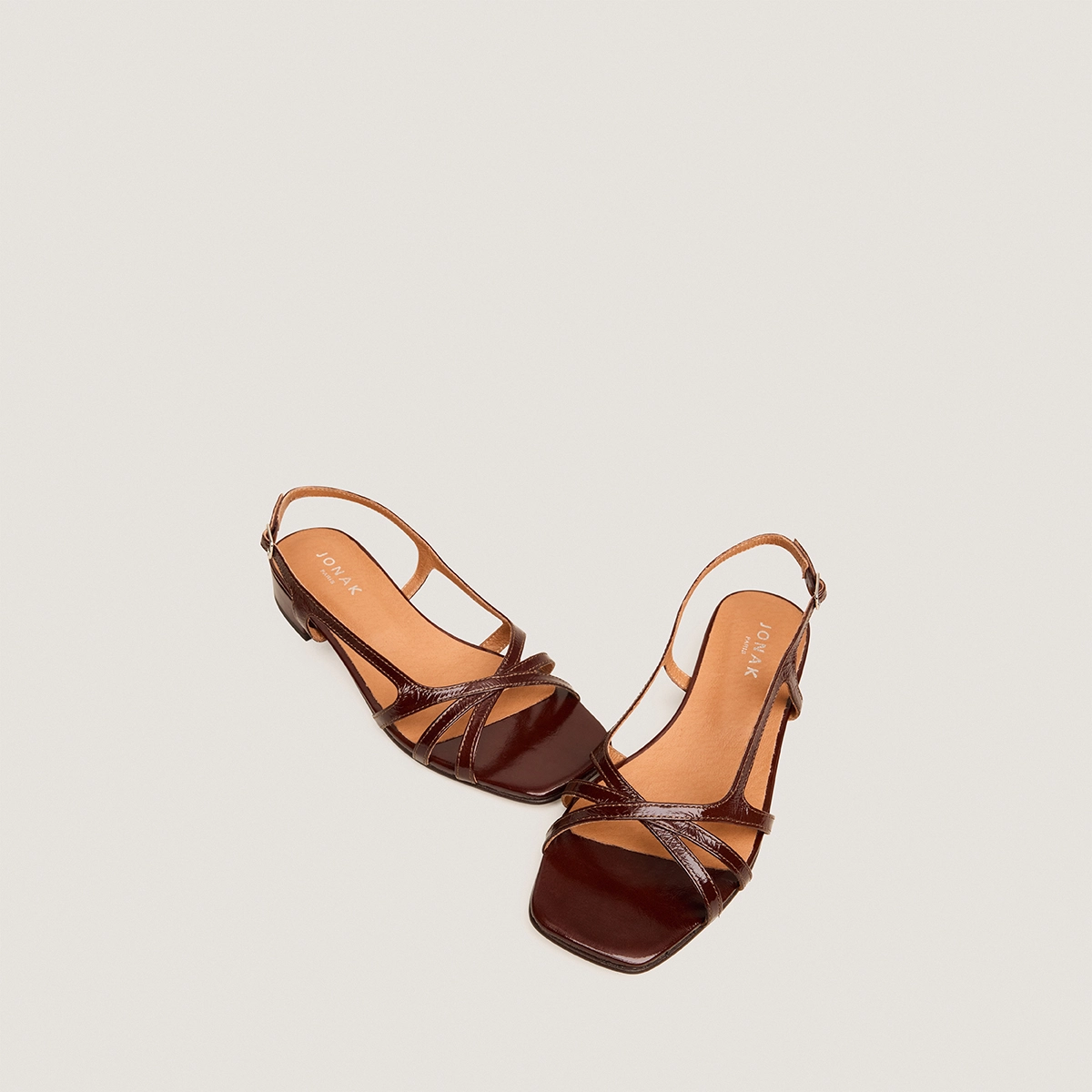 Low-heeled sandals in brown glossy leather | ARGOS