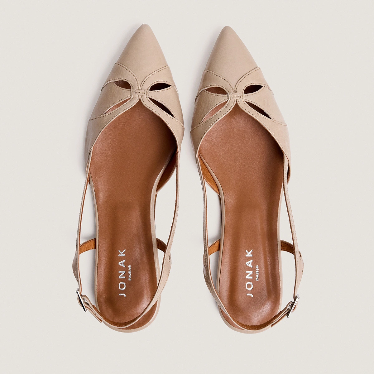 Pointed-toe slingback ballet flats in sand pleated patent leather | DAMOURA