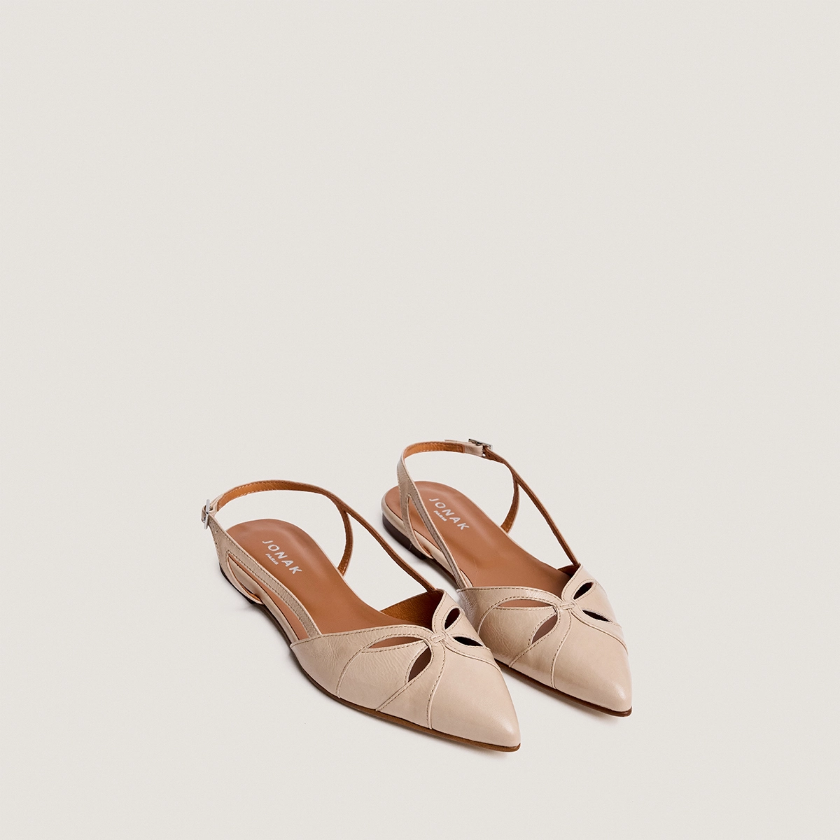 Pointed-toe slingback ballet flats in sand pleated patent leather | DAMOURA