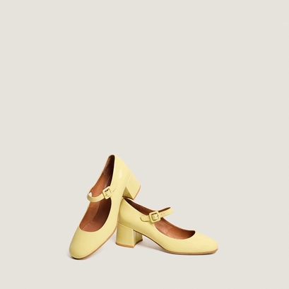 Heeled mary janes in pale yellow pleated patent leather | dittus