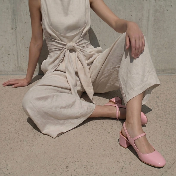 Open-back heeled mary janes in petal pink pleated patent leather | DOLLAR