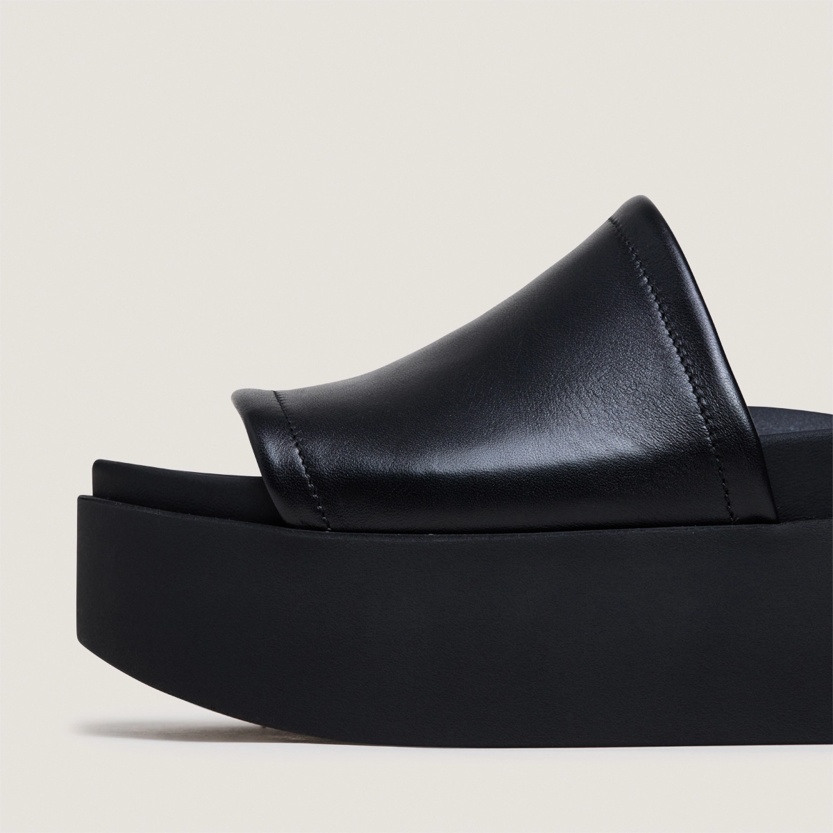 Platform mules in black leather | ETHEL