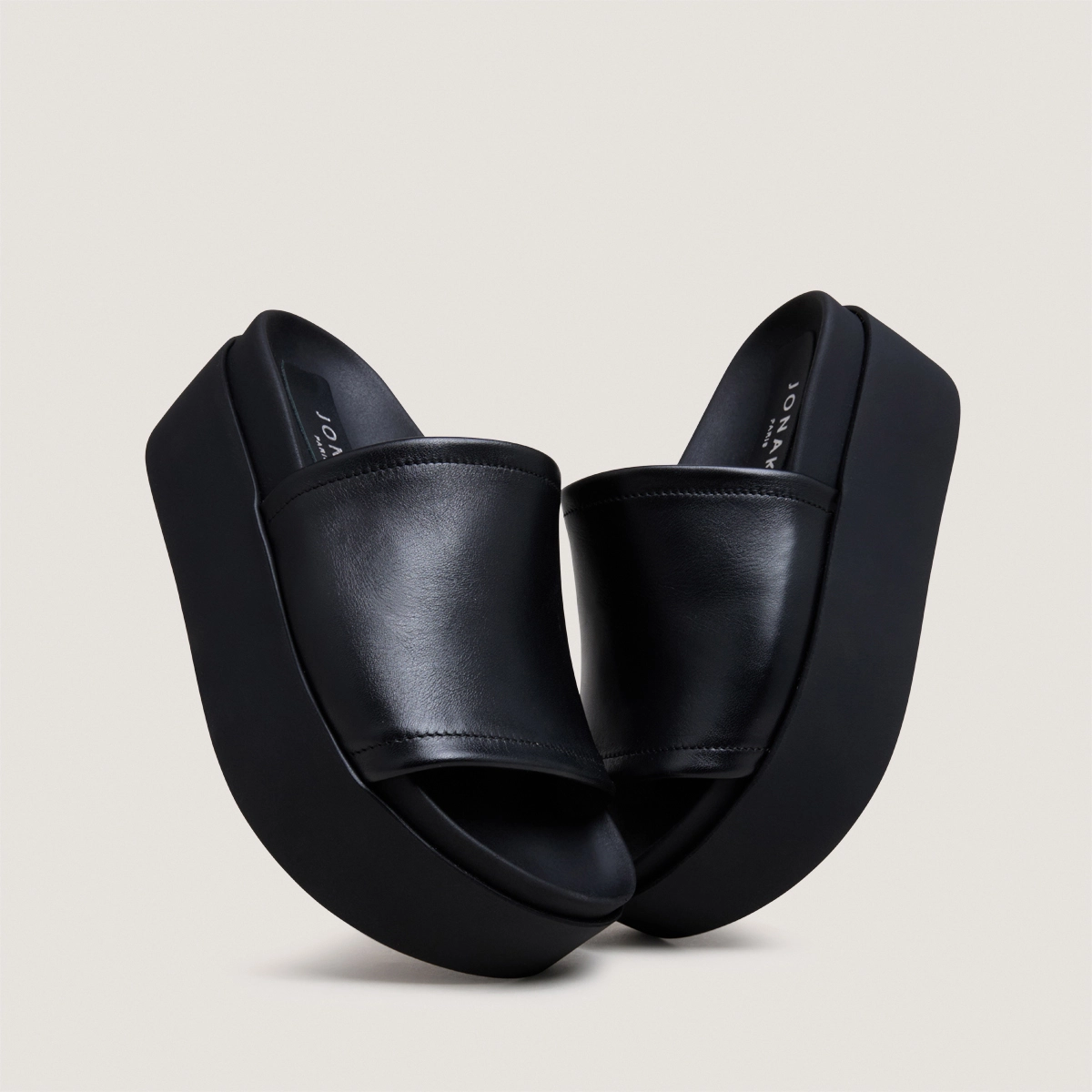 Platform mules in black leather | ETHEL