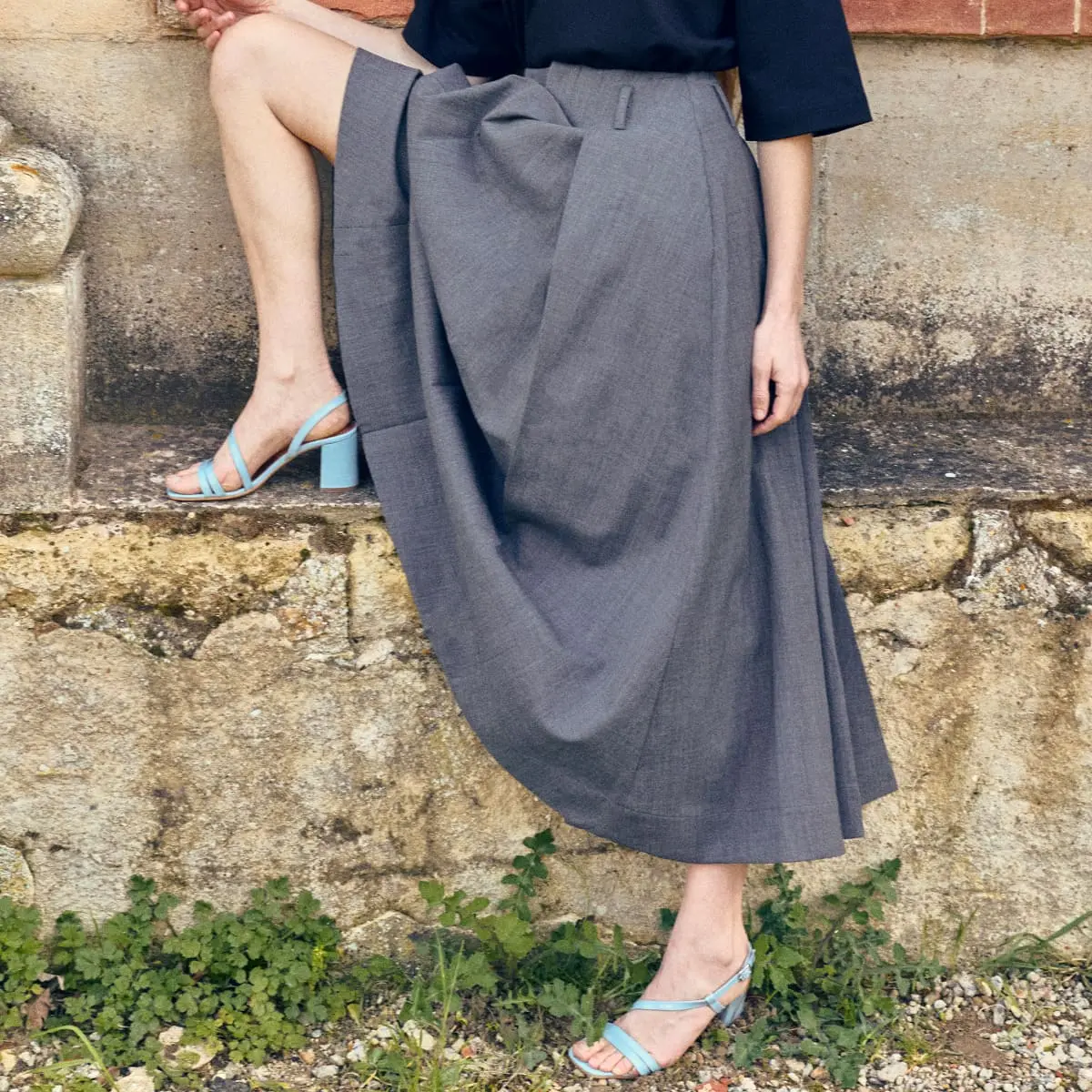 Heeled sandals with straps in sky blue pleated patent leather | VIMY