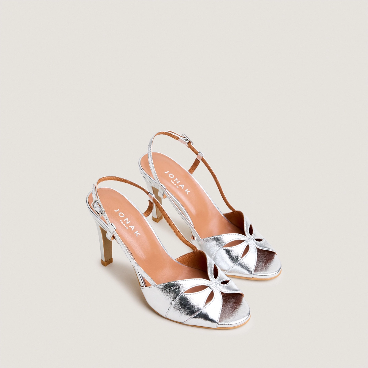 Open-heel pumps in silver metallic leather | DORELLE