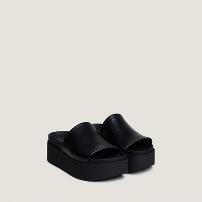 Platform mules in black leather | ethel