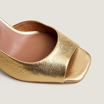High-heel slingback pumps in gold crackled leather | dira