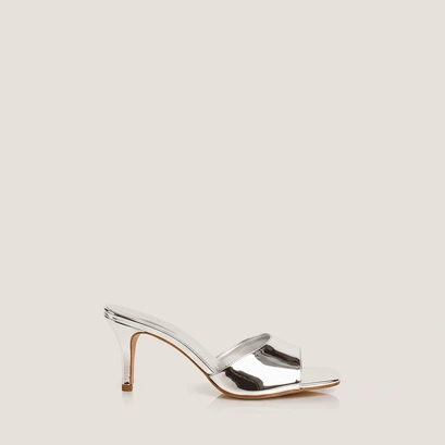 Heeled mules in silver mirror leather | vertigo