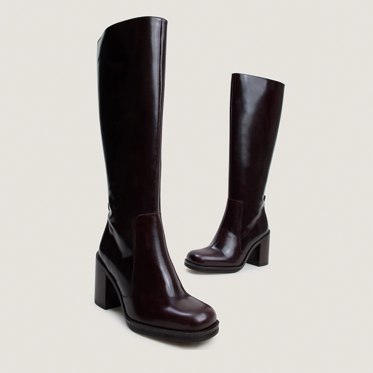Boots with overflowing heels in dark brown leather | BRETZEL