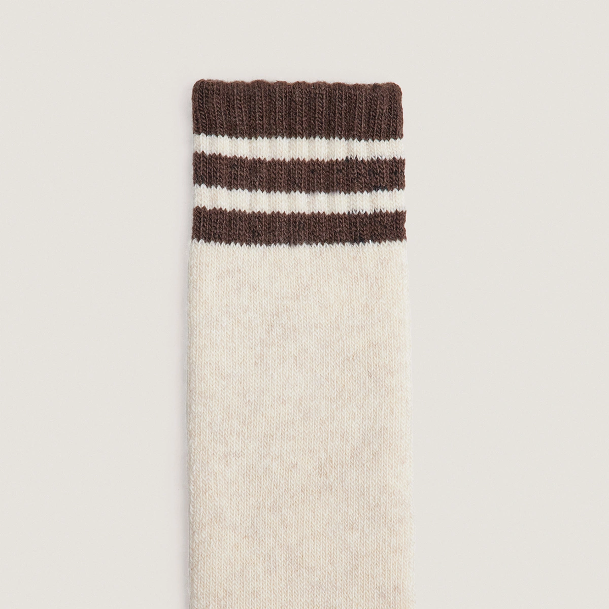 Striped knee-high socks in beige and black textile | FELIX