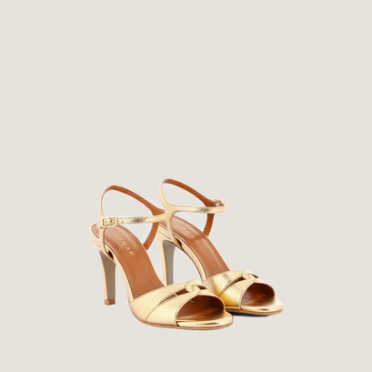 Heeled sandals with intertwined straps in gold crackled leather | diwi