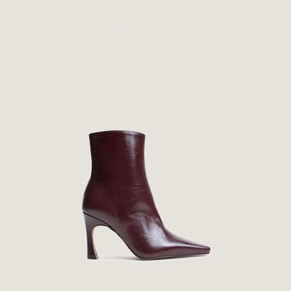 Heeled pointed toe ankle boots in chocolate aged leather | bronzo