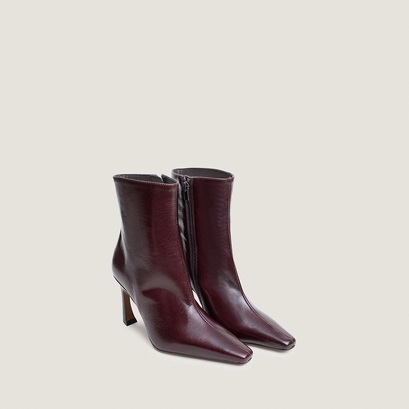 Heeled pointed toe ankle boots in chocolate aged leather | bronzo