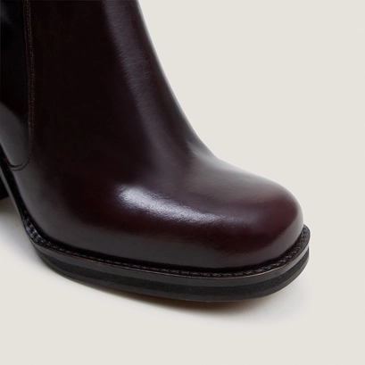 Boots with overflowing heels dark brown