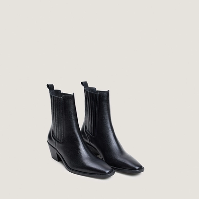 Heeled and gathered ankle boots in black grained leather | birman