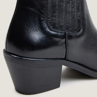 Heeled and gathered ankle boots in black grained leather | birman