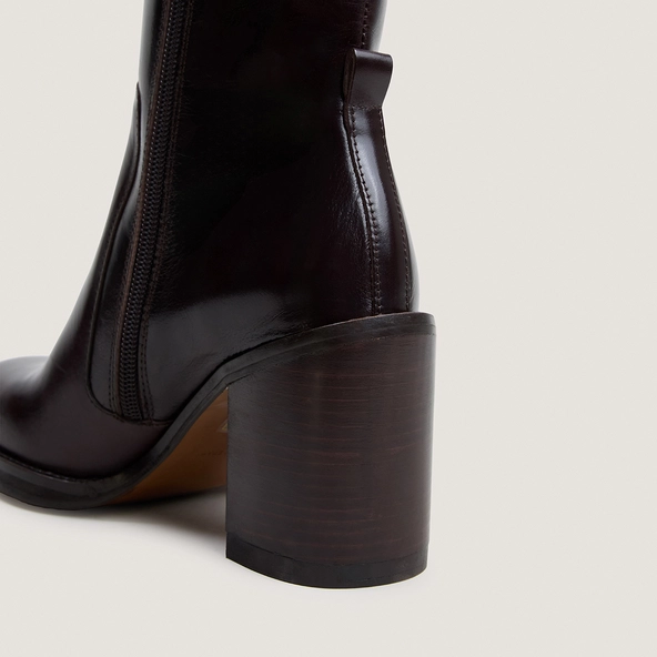 Boots with overflowing heels in dark brown leather | BRETZEL