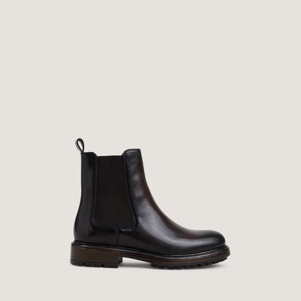 Low boots with elastic and lug soles in dark brown grained leather | CELINA