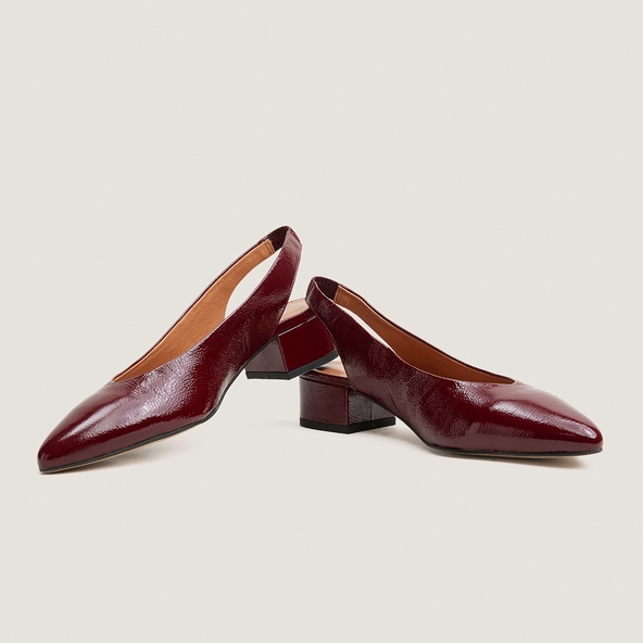 Ballet flats with open backs in burgundy pleated patent leather | VINCE