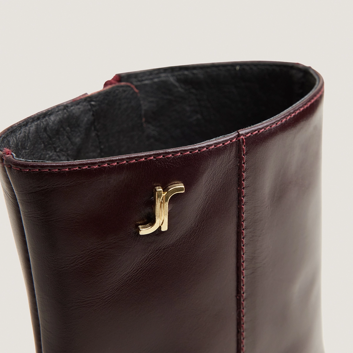 Heeled monogram ankle boots in burgundy leather | VAUBAS