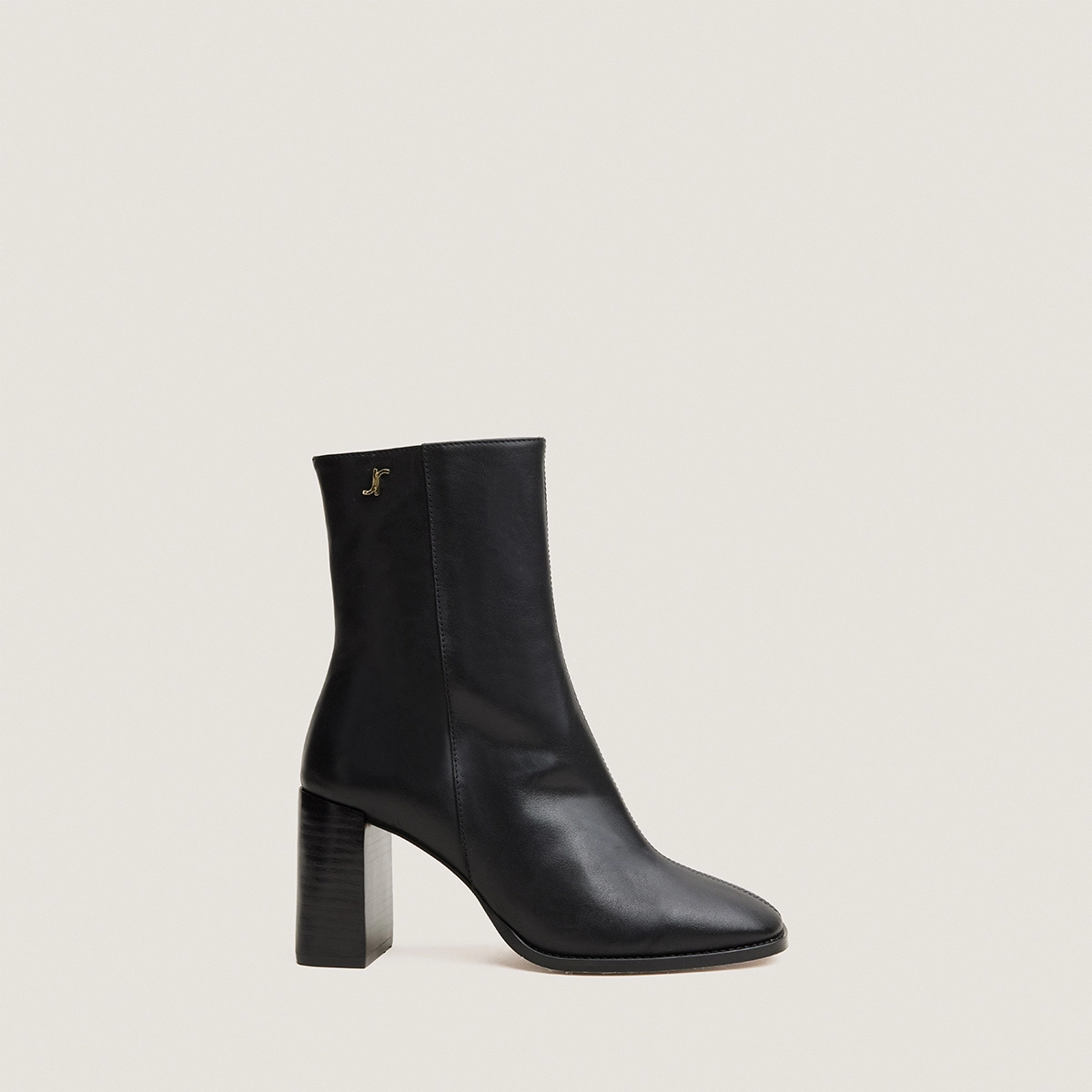 Heeled monogram ankle boots in black leather | VAUBAS
