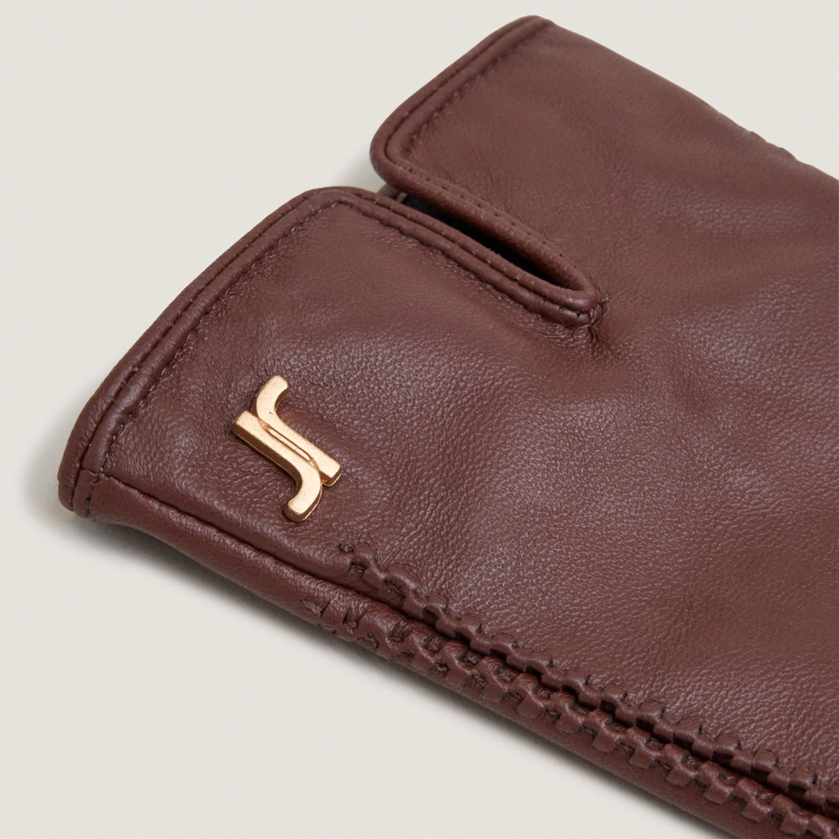 Monogram gloves in brown leather | JUPITER